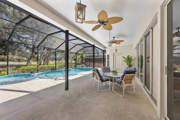 a view of hall way with furniture