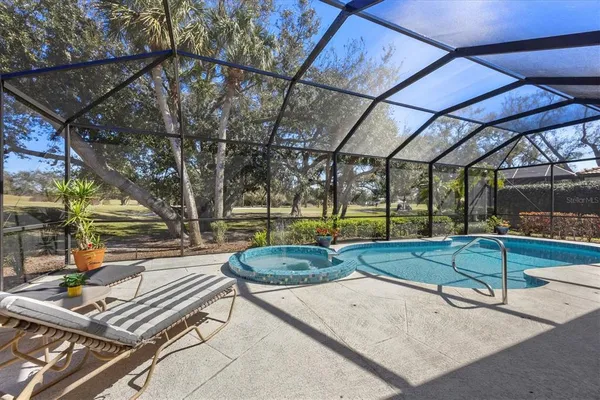 an outdoor space with furniture and umbrella