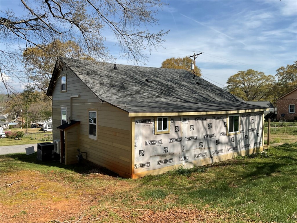 112 Overbrook Street Pickens, SC 29671 - Photo 17 of 19 This charming home features new siding and a classic roof, ready for your finishing touches.