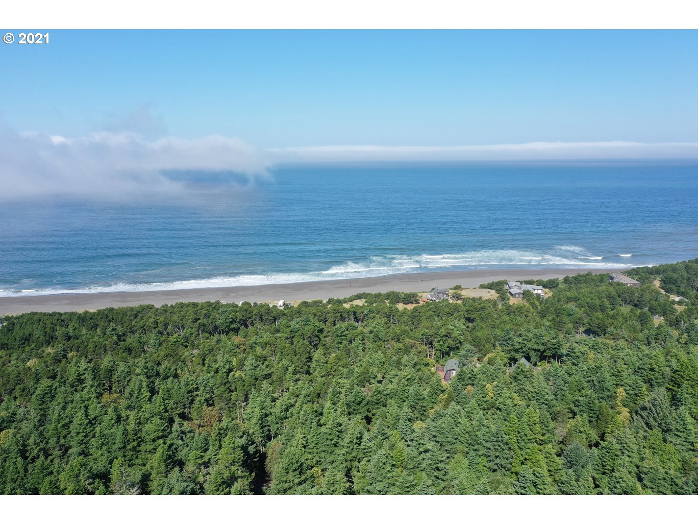 0 Gull Rd Port, Unit 1900 Port Orford, OR 97465 - Photo 4 of 18 a view of an ocean and a yard