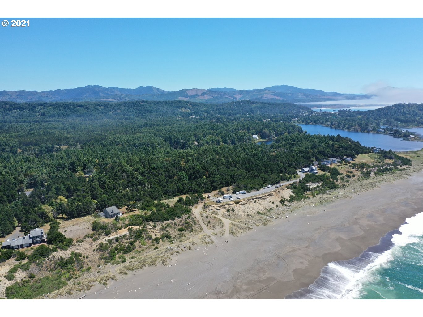 0 Gull Rd Port, Unit 1900 Port Orford, OR 97465 - Photo 5 of 18 a view of a mountain with a field