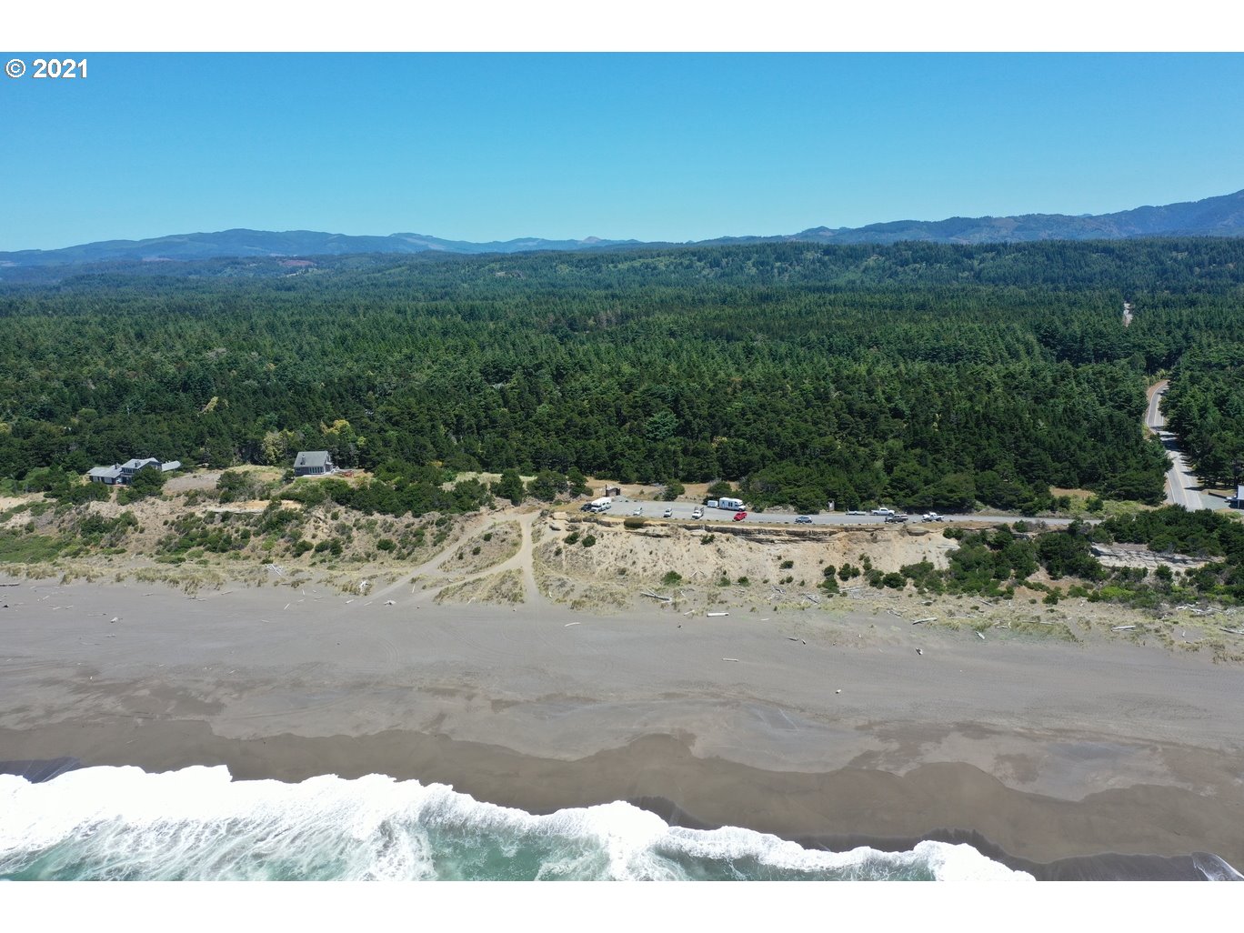 0 Gull Rd Port, Unit 1900 Port Orford, OR 97465 - Photo 8 of 18 a view of a yard with a mountain