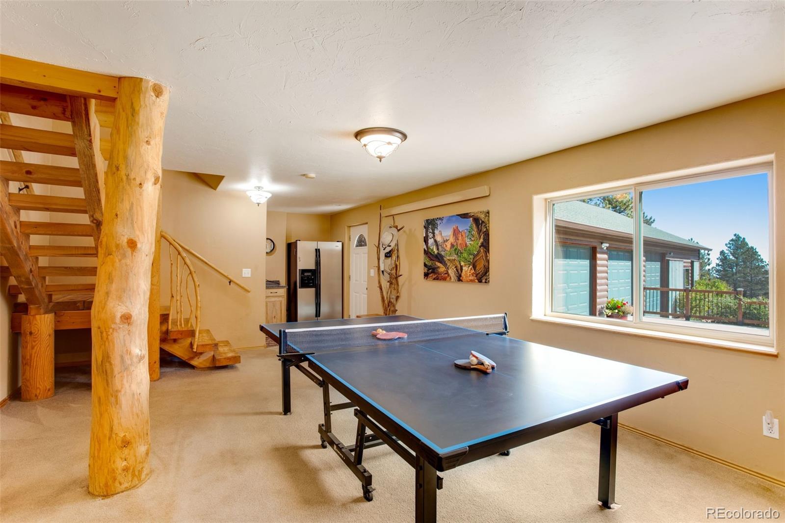 427 Wilderness Ridge Way Bellvue, CO 80512 - Photo 38 of 50 a view of a room with gym equipment