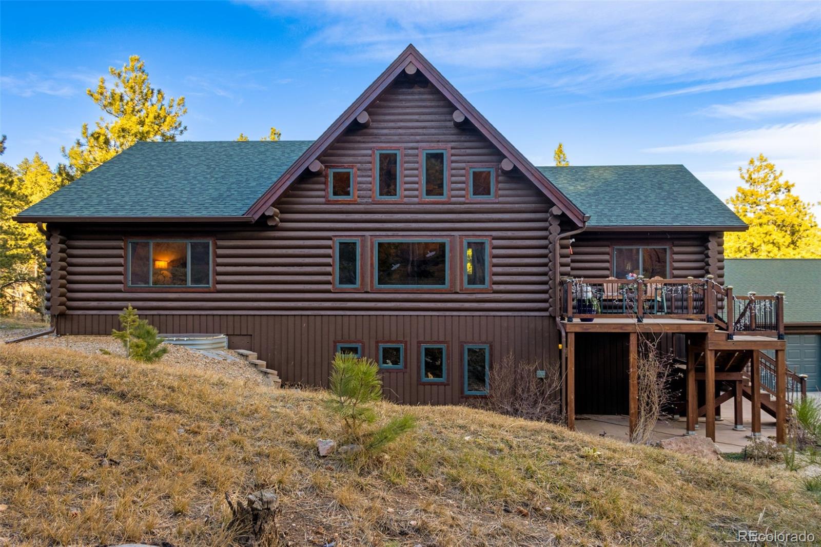 427 Wilderness Ridge Way Bellvue, CO 80512 - Photo 45 of 50 a house view with a outdoor space