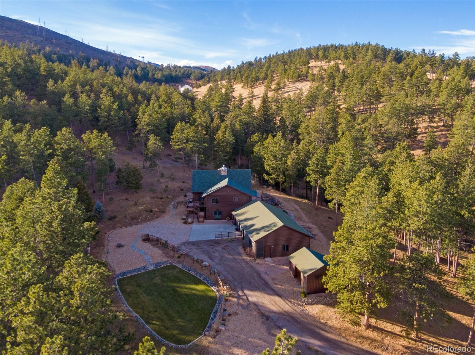 427 Wilderness Ridge Way Bellvue, CO 80512 - Photo 6 of 50 an aerial view of a house