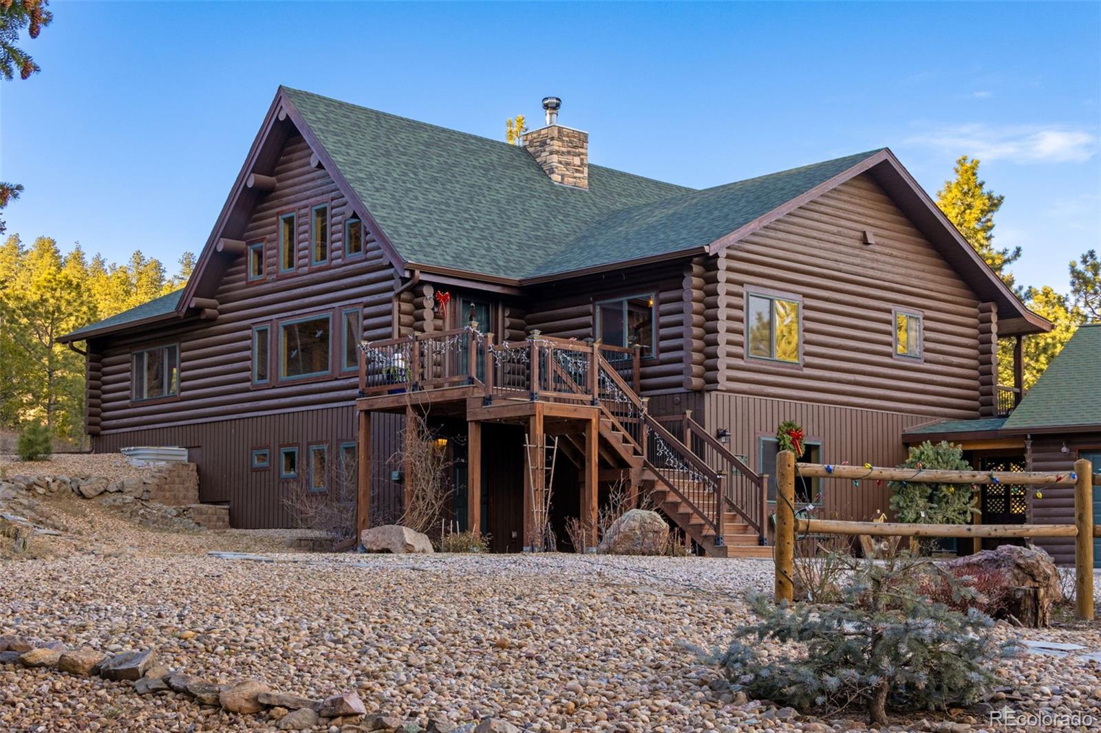 427 Wilderness Ridge Way Bellvue, CO 80512 - Photo 7 of 50 a house view with a outdoor space
