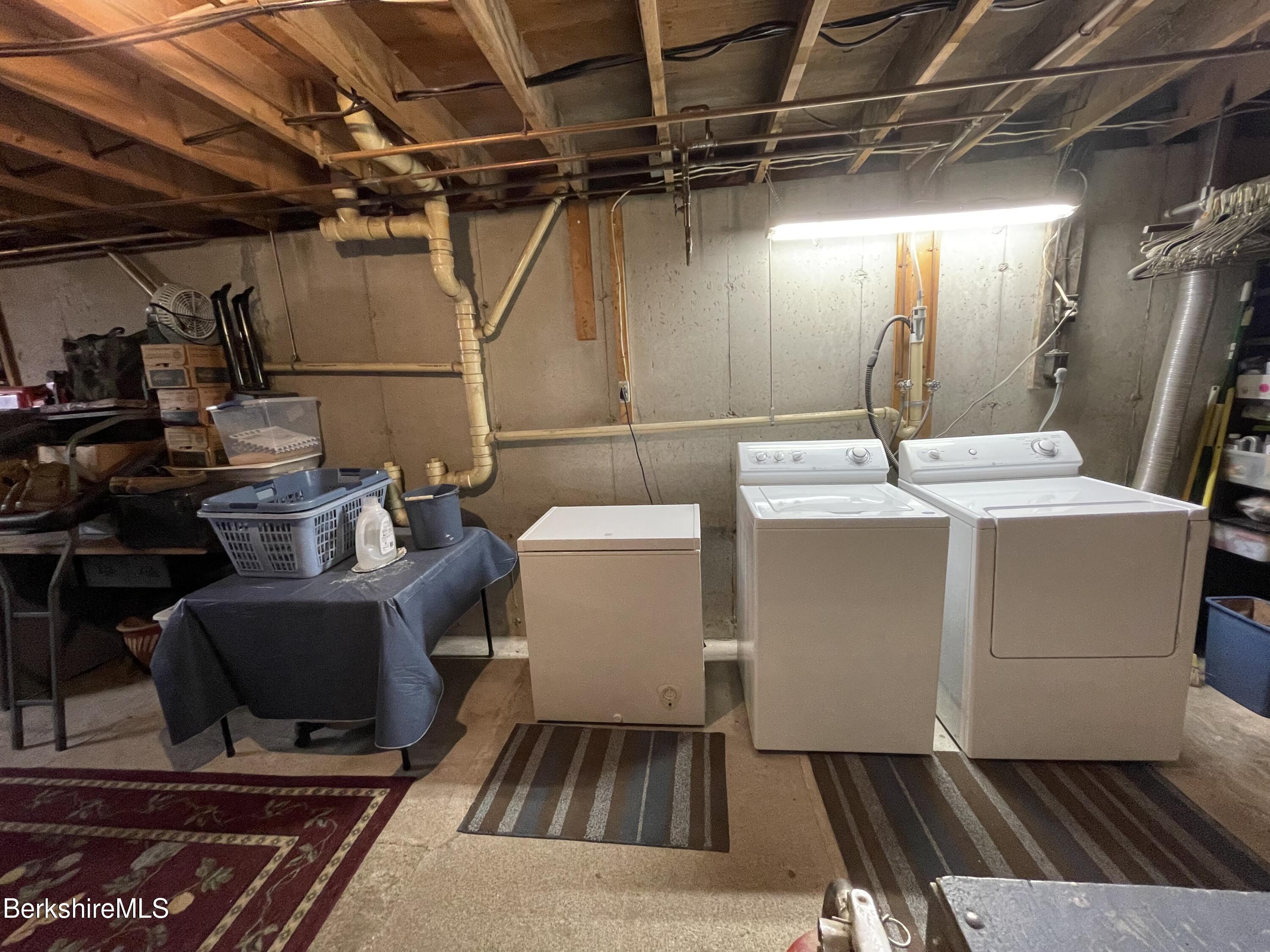 848 E Road Stamford, VT 05352 - Photo 20 of 26 a utility room with dryer and washer
