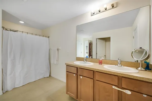 a bedroom with a bed and furniture