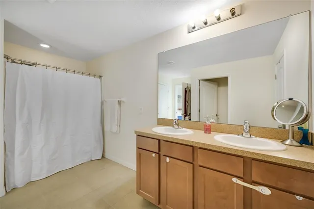 a bedroom with a bed and furniture