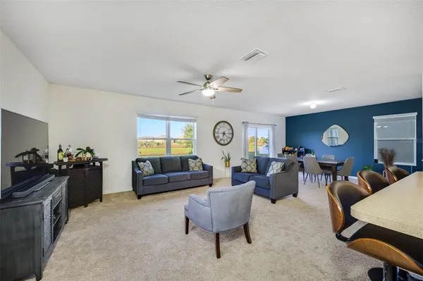 a kitchen with a stove and a refrigerator