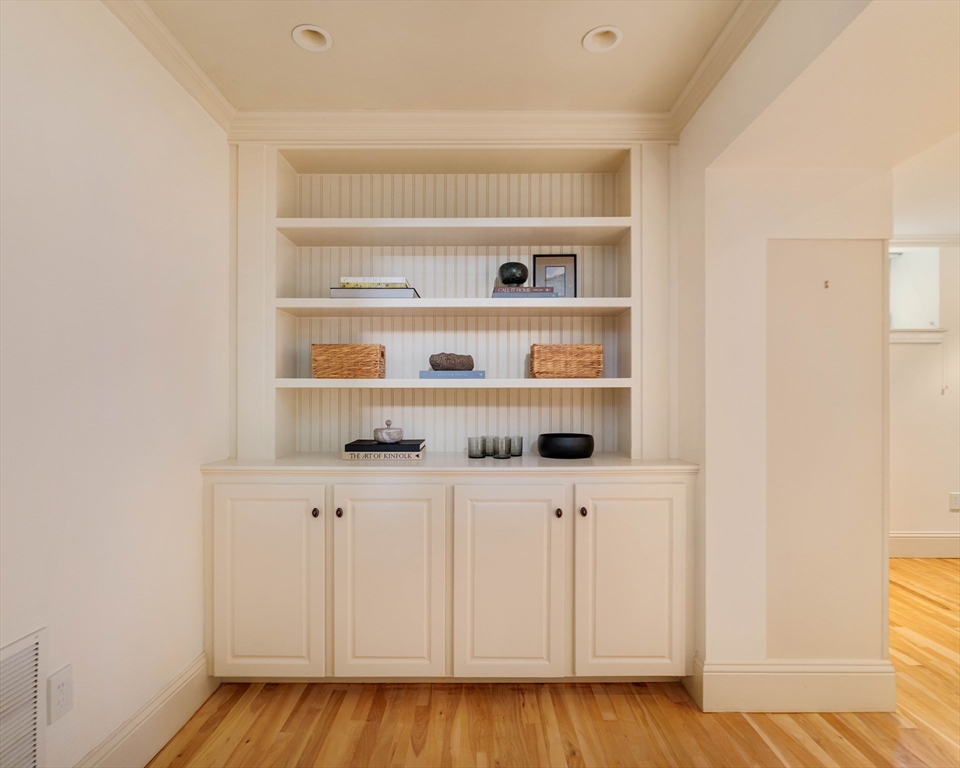 54 Orchard Street, Unit 1 Boston, MA 02130 - Photo 30 of 36 a view of walk in closet with empty racks