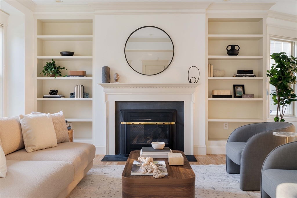 54 Orchard Street, Unit 1 Boston, MA 02130 - Photo 3 of 36 a living room with furniture and a fireplace
