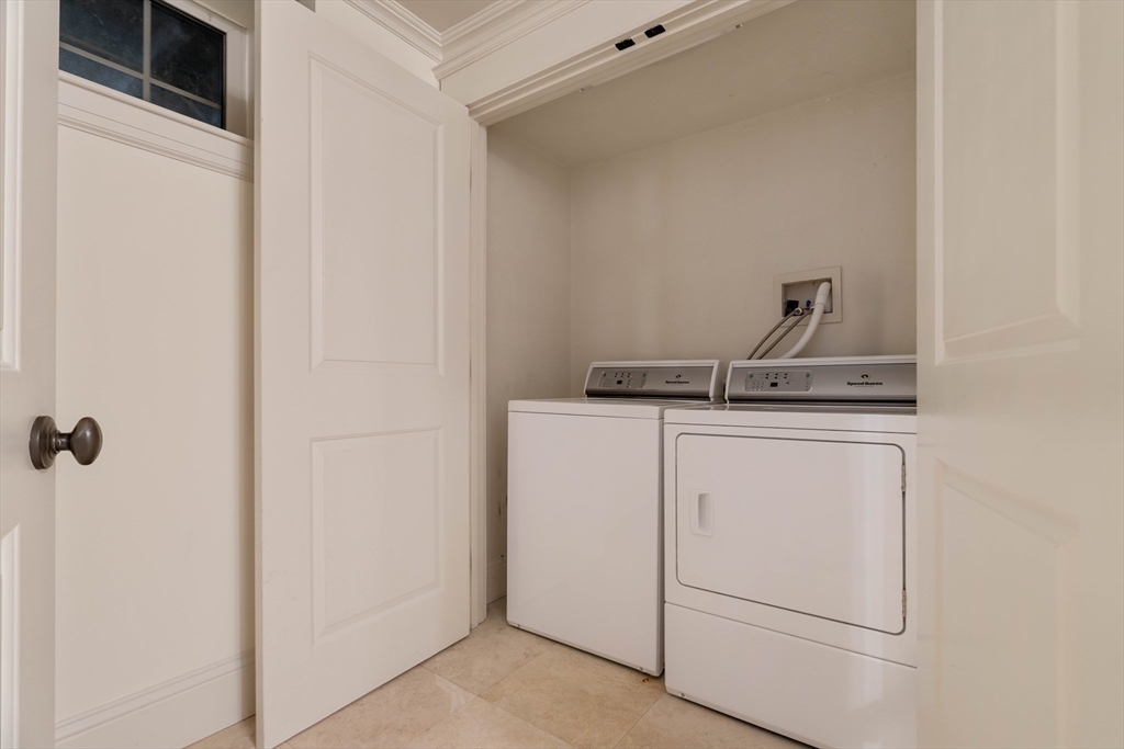 54 Orchard Street, Unit 1 Boston, MA 02130 - Photo 32 of 36 a utility room with dryer and washer