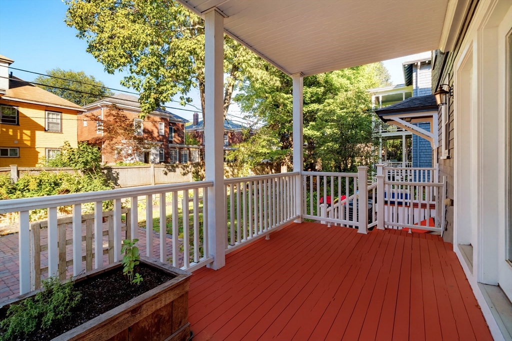 54 Orchard Street, Unit 1 Boston, MA 02130 - Photo 36 of 36 a balcony with wooden floor and outdoor space