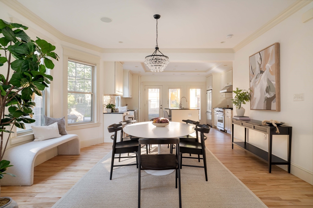 54 Orchard Street, Unit 1 Boston, MA 02130 - Photo 7 of 36 a view of a a dining room with furniture window and wooden floor