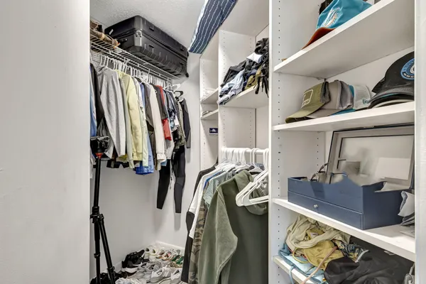 a view of a chairs and table in backyard