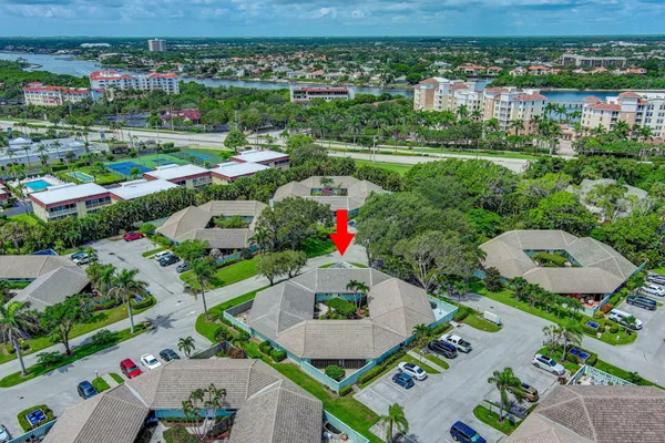 an aerial view of a houses and lake view
