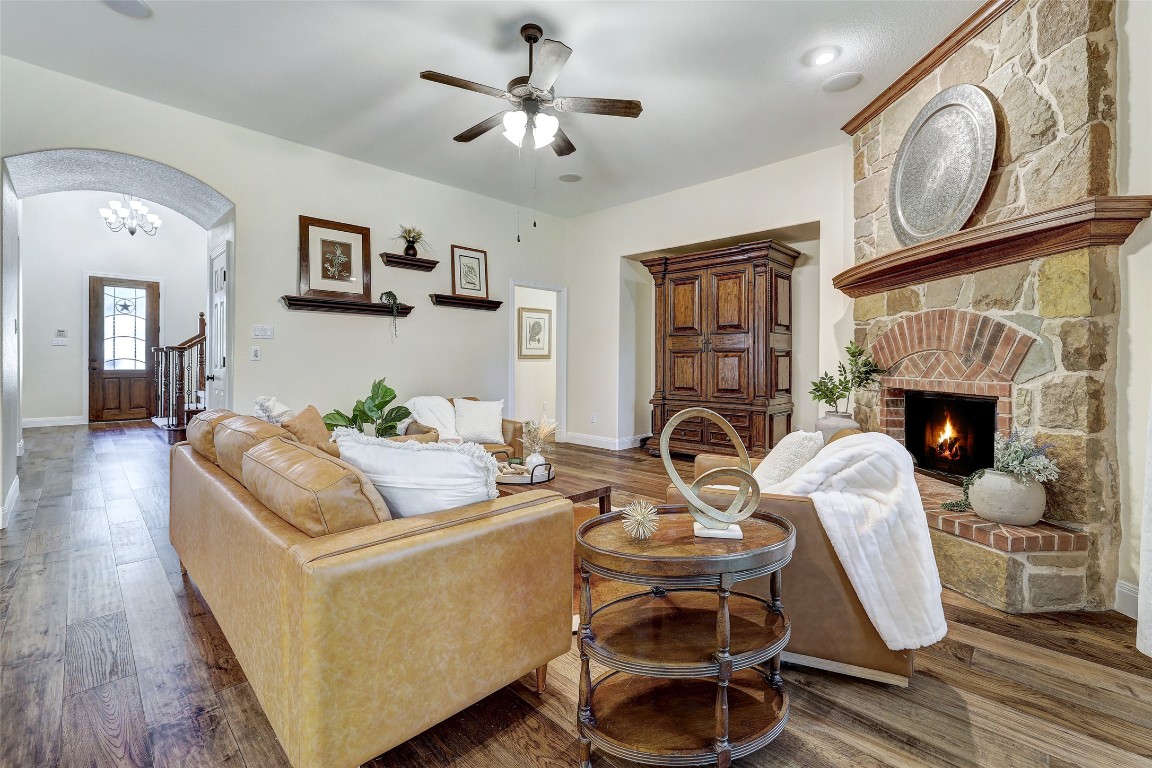 3600 Alexandrite Way Round Rock, TX 78681 - Photo 14 of 40 a living room with furniture a flat screen tv and fireplace