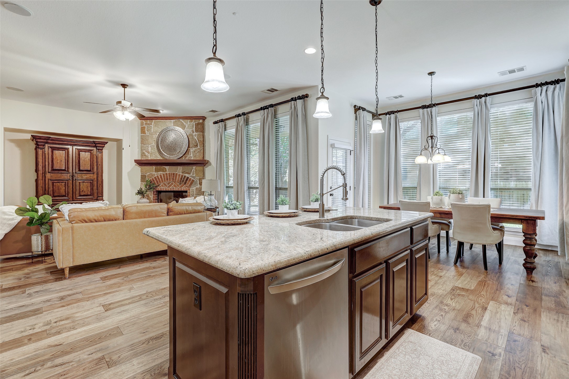 3600 Alexandrite Way Round Rock, TX 78681 - Photo 14 of 40 a open kitchen with a table and chairs in it