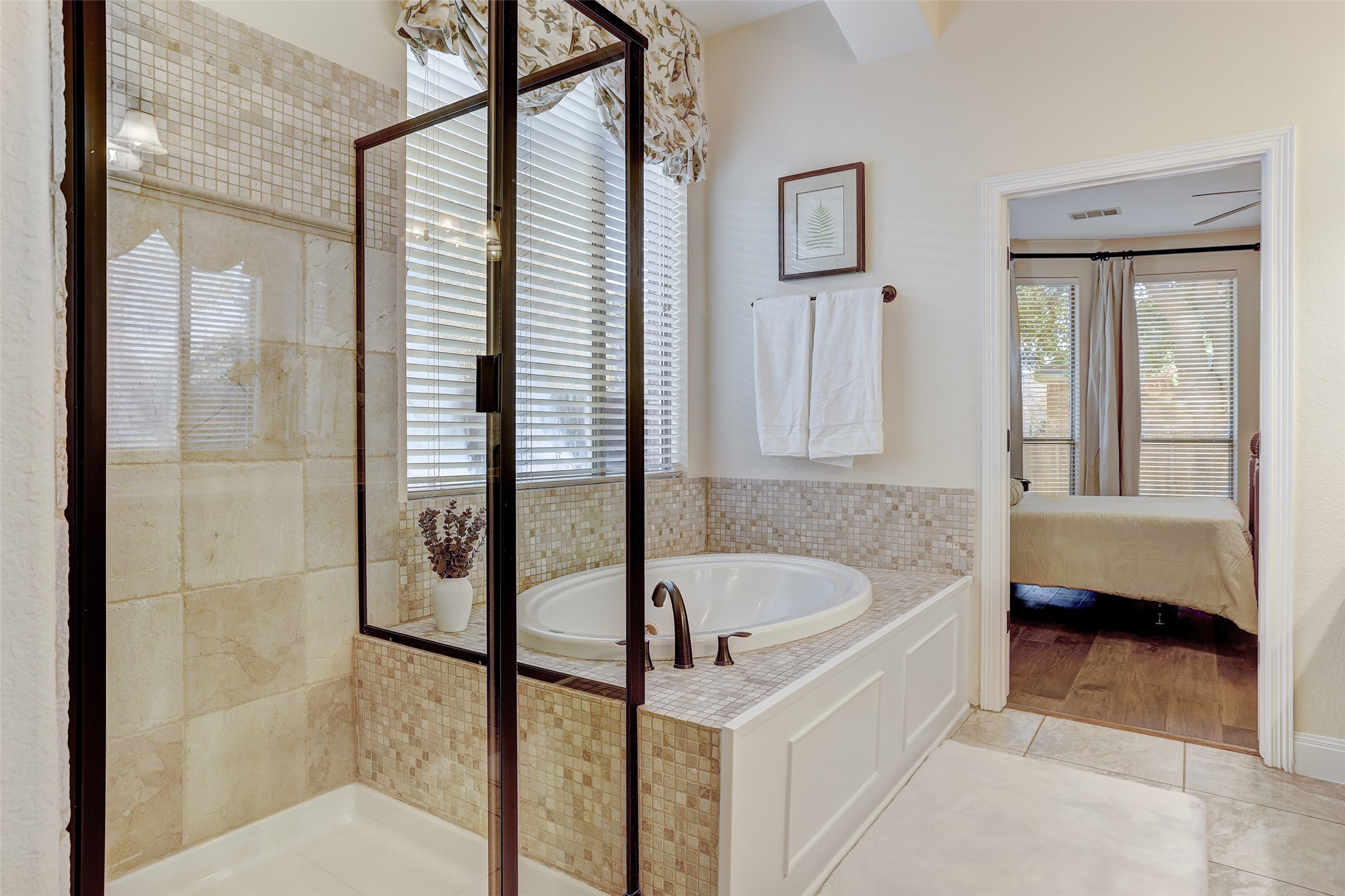 3600 Alexandrite Way Round Rock, TX 78681 - Photo 22 of 40 a bathroom with a tub and a shower