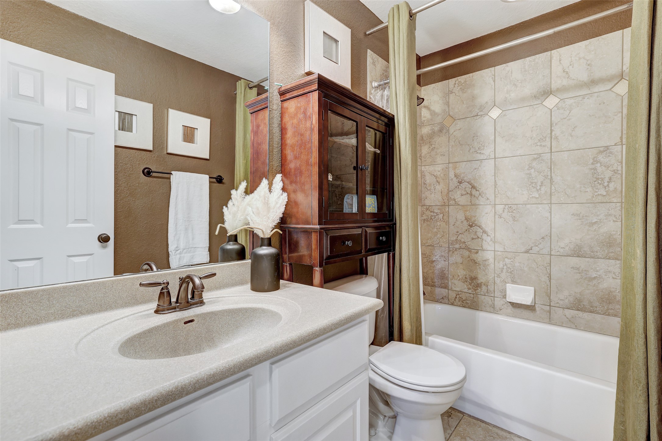 3600 Alexandrite Way Round Rock, TX 78681 - Photo 30 of 40 a bathroom with a sink toilet and shower