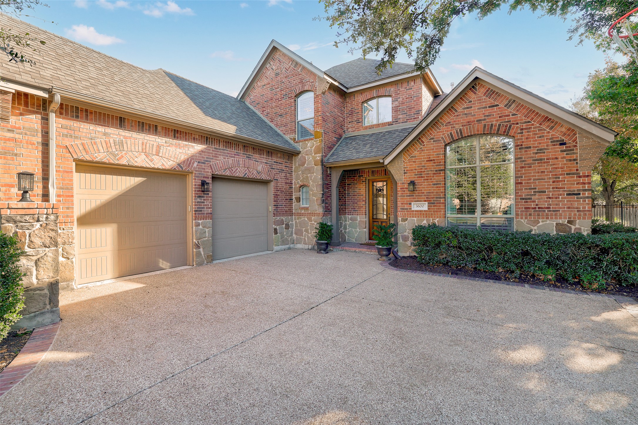 3600 Alexandrite Way Round Rock, TX 78681 - Photo 3 of 40 a front view of a house with garden