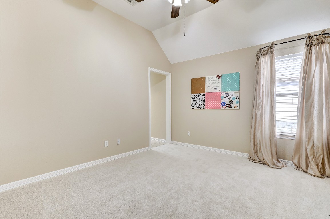 3600 Alexandrite Way Round Rock, TX 78681 - Photo 36 of 40 an empty room with window and ceiling fan