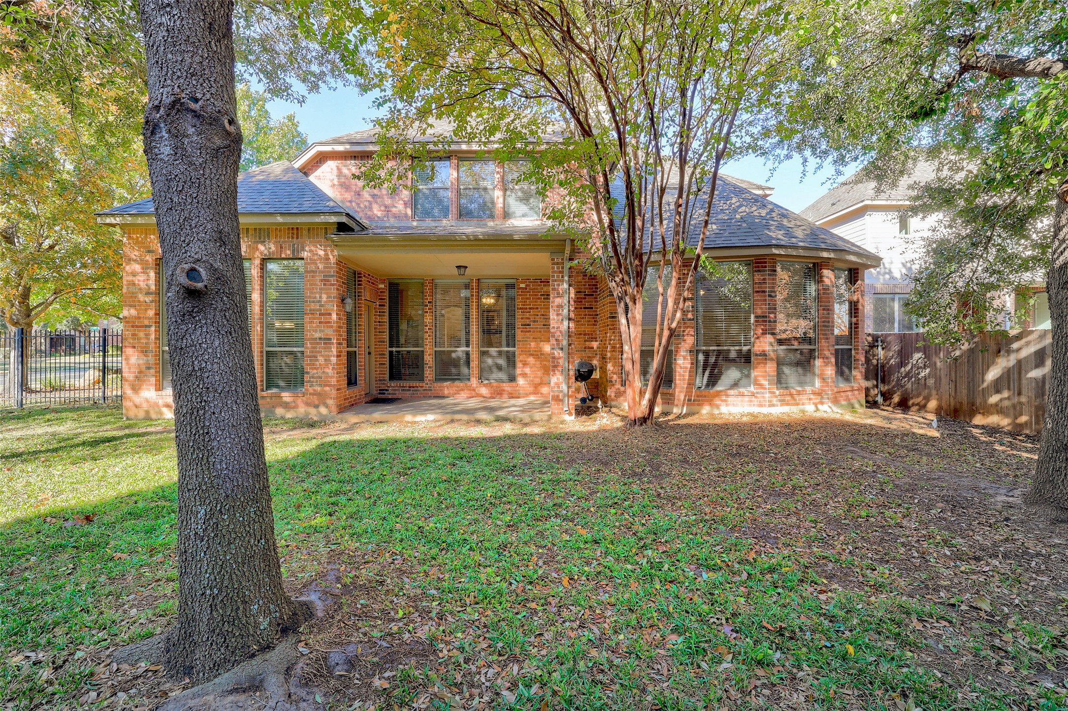 3600 Alexandrite Way Round Rock, TX 78681 - Photo 38 of 40 a view of a house with a tree and a yard