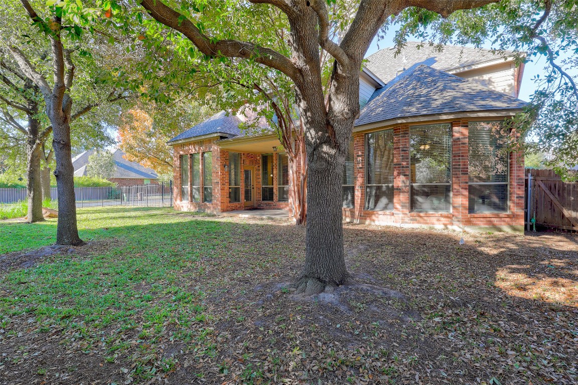 3600 Alexandrite Way Round Rock, TX 78681 - Photo 38 of 40 a view of a house with backyard and a tree