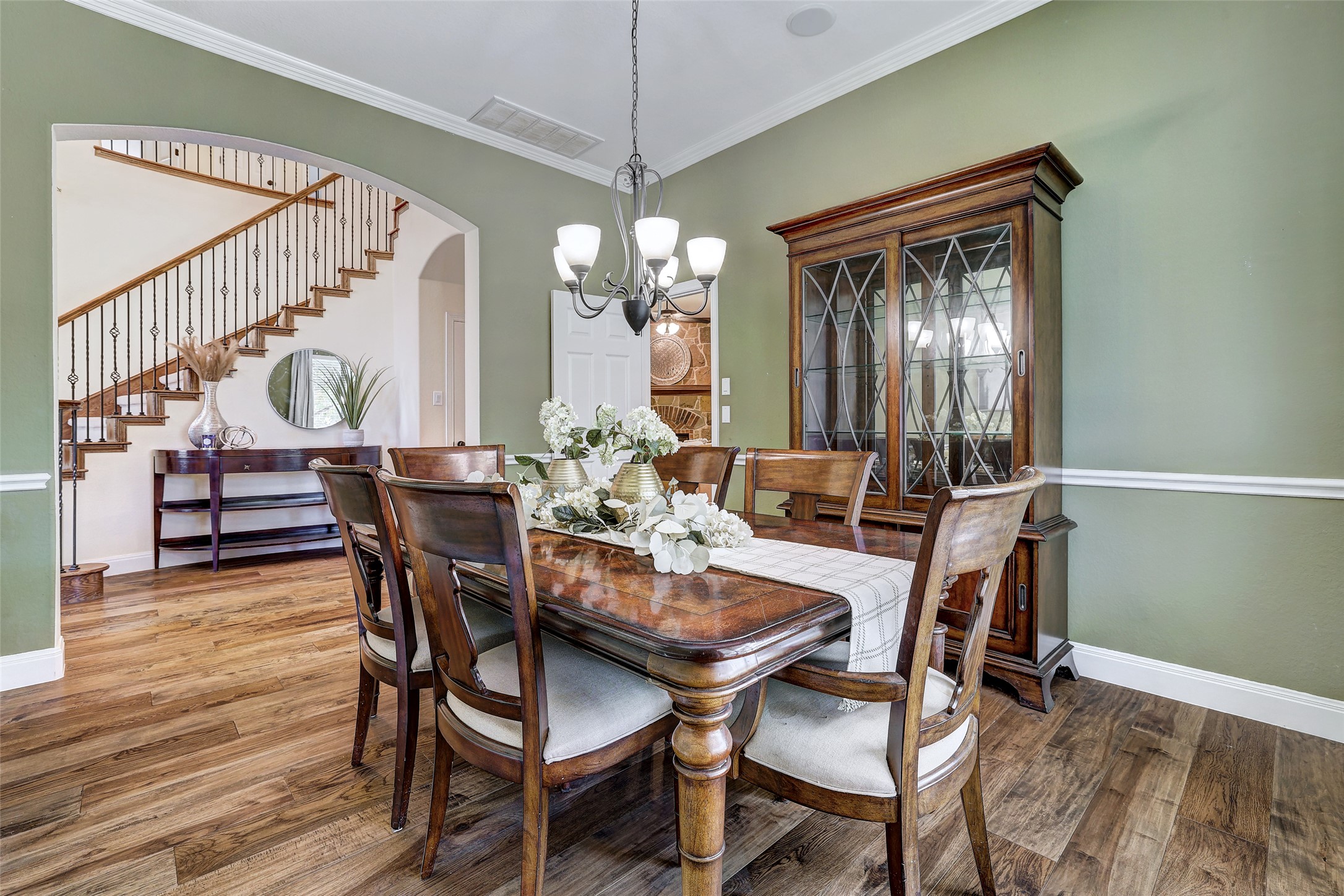 3600 Alexandrite Way Round Rock, TX 78681 - Photo 10 of 40 a view of a dining room with furniture and wooden floor