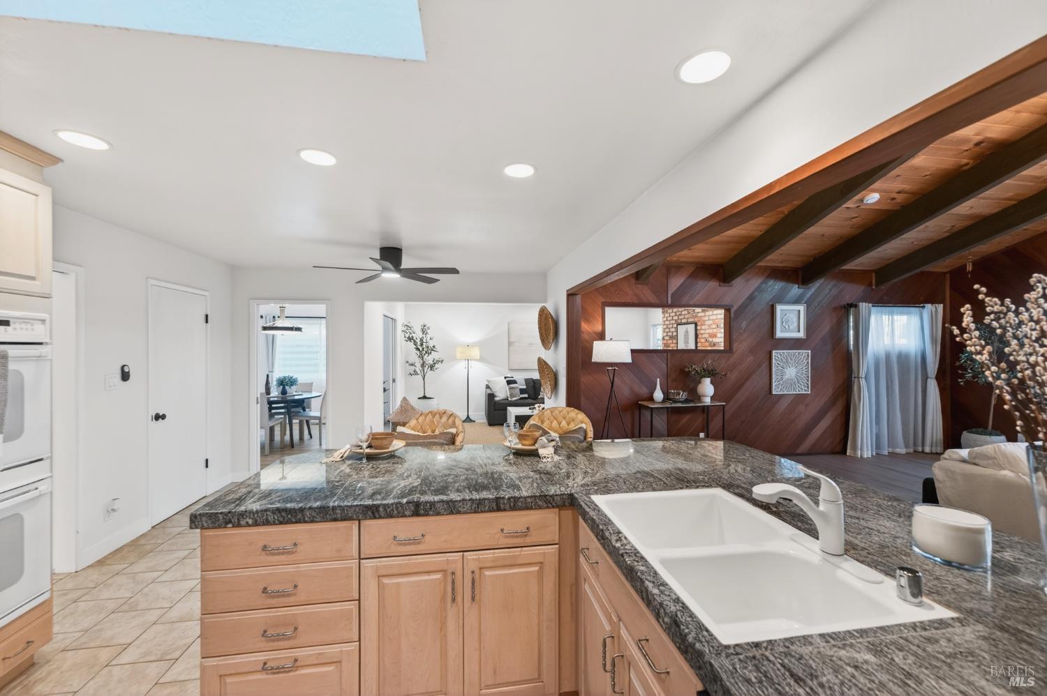 2447 Rigdon Street Napa, CA 94558 - Photo 7 of 79 a bathroom with sinks granite countertop a sink and a granite counter tops