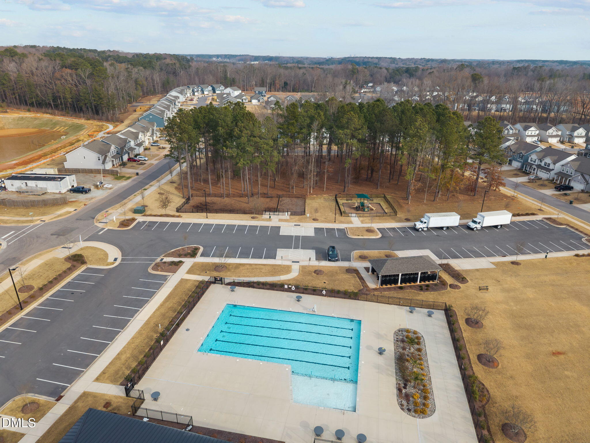 272 Fosterton Cottage Way Raleigh, NC 27603 - Photo 5 of 35 a view of a swimming pool with a lake view