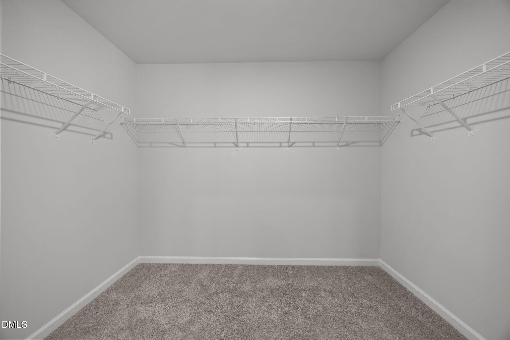 272 Fosterton Cottage Way Raleigh, NC 27603 - Photo 10 of 35 a view of an empty walk in closet