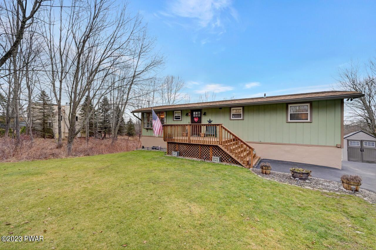 1597 Ridgeview Drive Lake Ariel, PA 18436 - Photo 56 of 92 a view of a backyard with a cabin