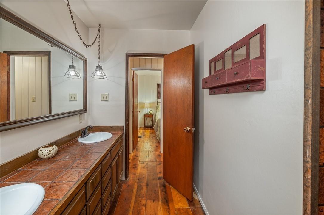 53644 Acorn Road Mariposa, CA 95338 - Photo 21 of 65 Downstairs hall bathroom with dual sinks
