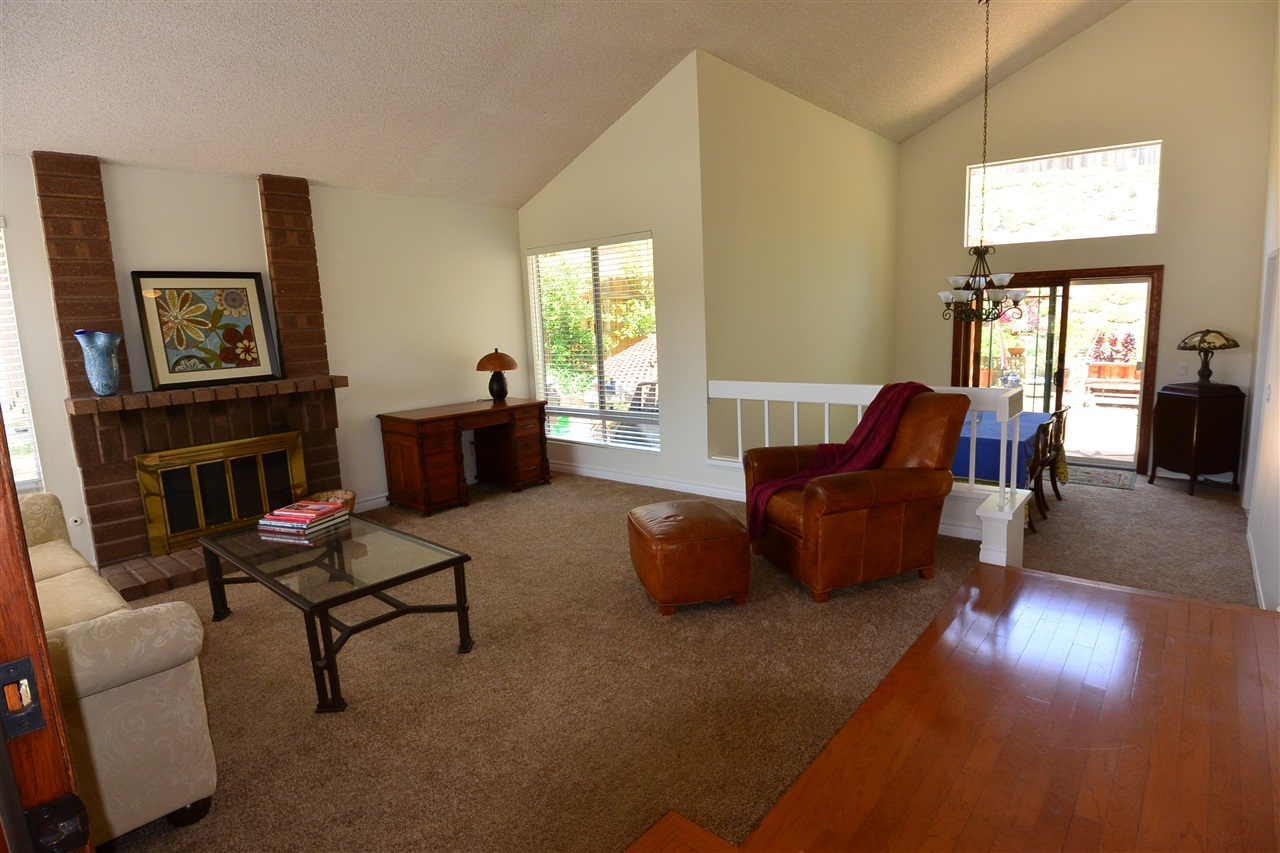 10366 Moorpark Street Spring Valley, CA 91978 - Photo 2 of 25 GIANT LIVING ROOM LEADS TO FORMAL DINING ROOM AND BACK YARD