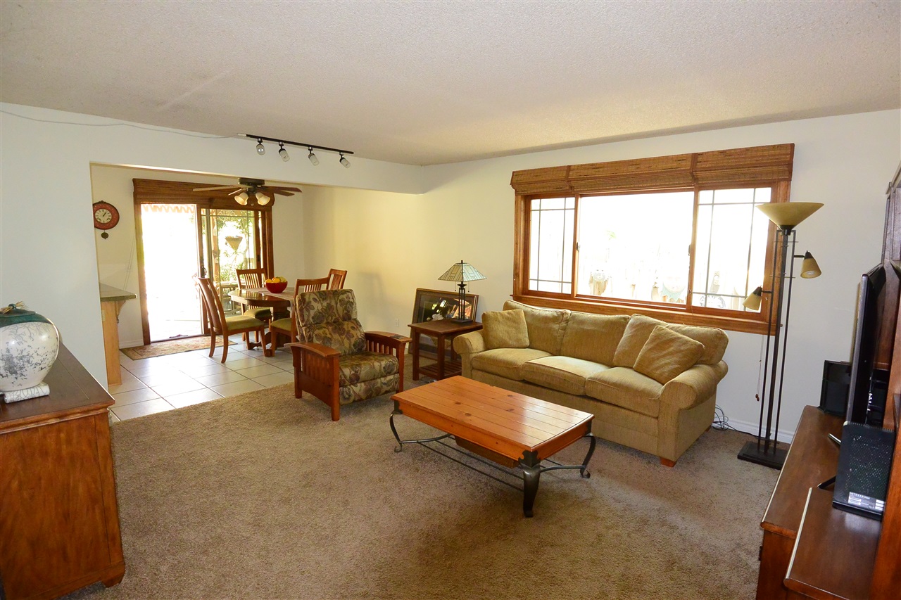 10366 Moorpark Street Spring Valley, CA 91978 - Photo 11 of 25 FAMILY ROOM LEADING INTO BREAKFAST NOOK WITH MORE SLIDING GLASS DOORS TO THE BACK YARD.