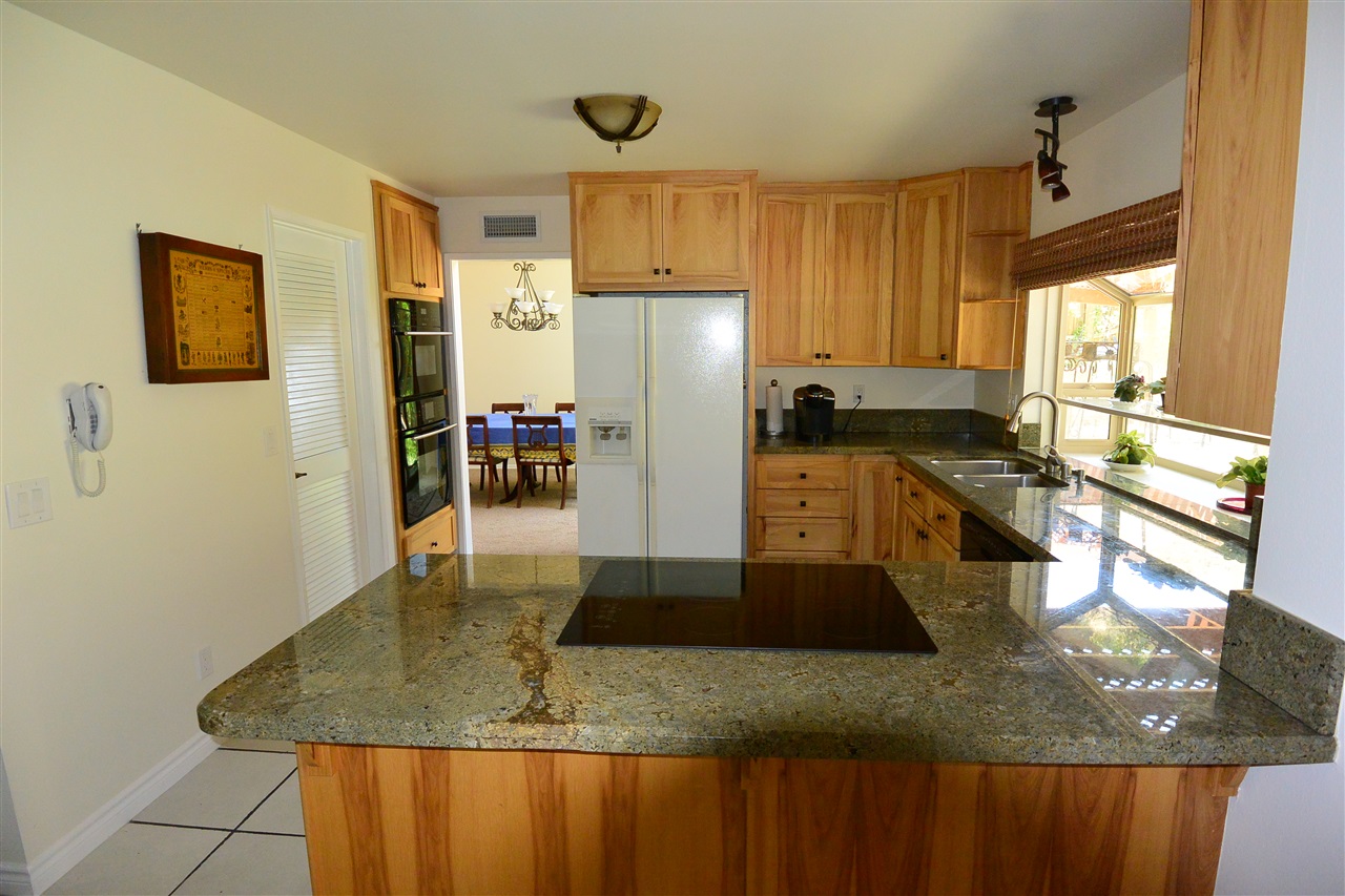 10366 Moorpark Street Spring Valley, CA 91978 - Photo 7 of 25 REMODELED KITCHEN WITH HIGH END CABINETRY