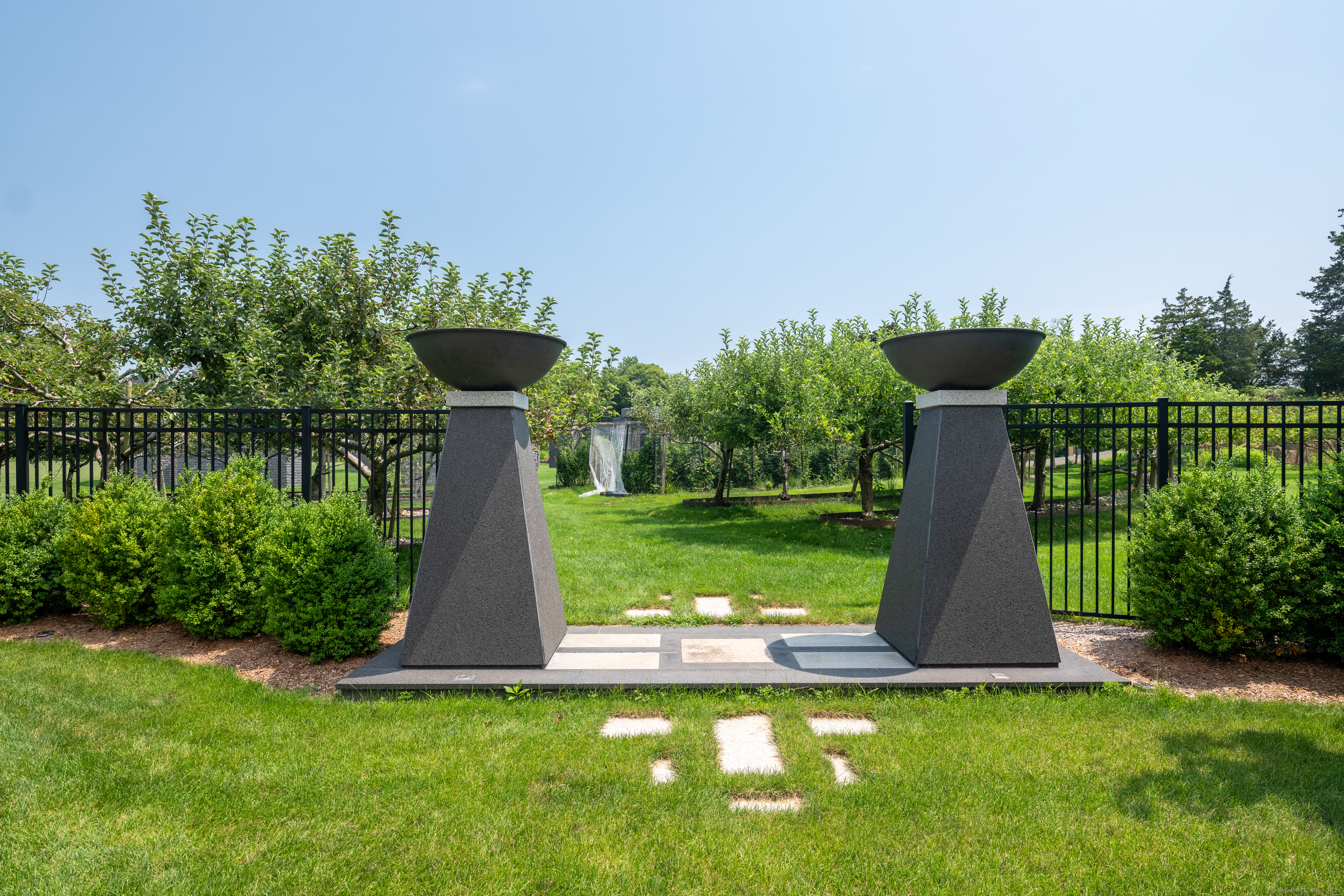 215 Uncas Point Road Guilford, CT 06437 - Photo 12 of 40 a view of a garden with a slide