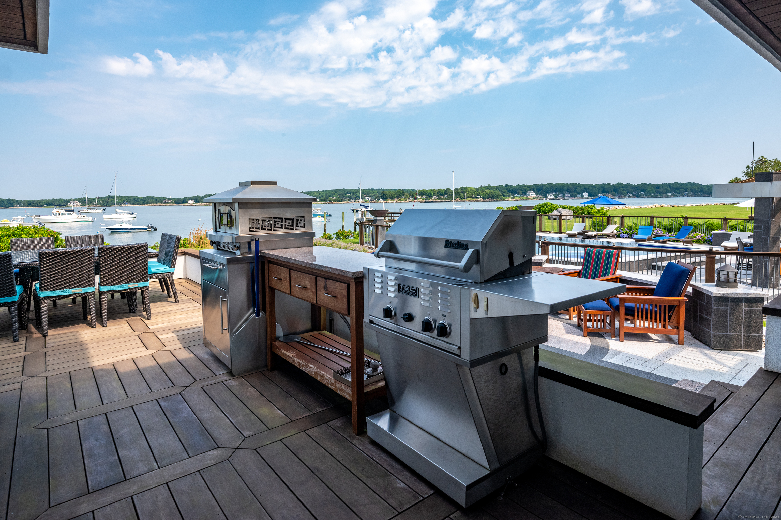 215 Uncas Point Road Guilford, CT 06437 - Photo 27 of 40 a view of a terrace with seating area