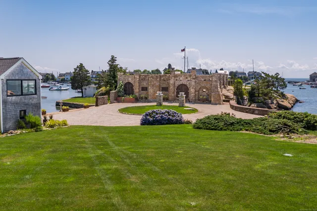 a view of a terrace with sitting area