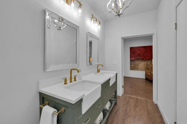 a bedroom with a bed and a lamp