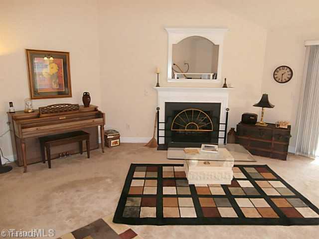 8625 Circle Drive Rural Hall, NC 27045 - Photo 3 of 16 Den/Family/Great Room. Neutral decor throughout the house. Spacious Great Room can hold quite a bit of furniture. Vaulted ceiling, ceiling fan and TV nook over the FP which has gas logs.