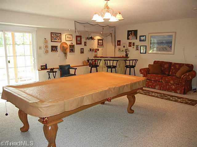 8625 Circle Drive Rural Hall, NC 27045 - Photo 10 of 16 Playroom. Another view of the spacious playroom. The seller is willing to leave the mounted TV in this room.