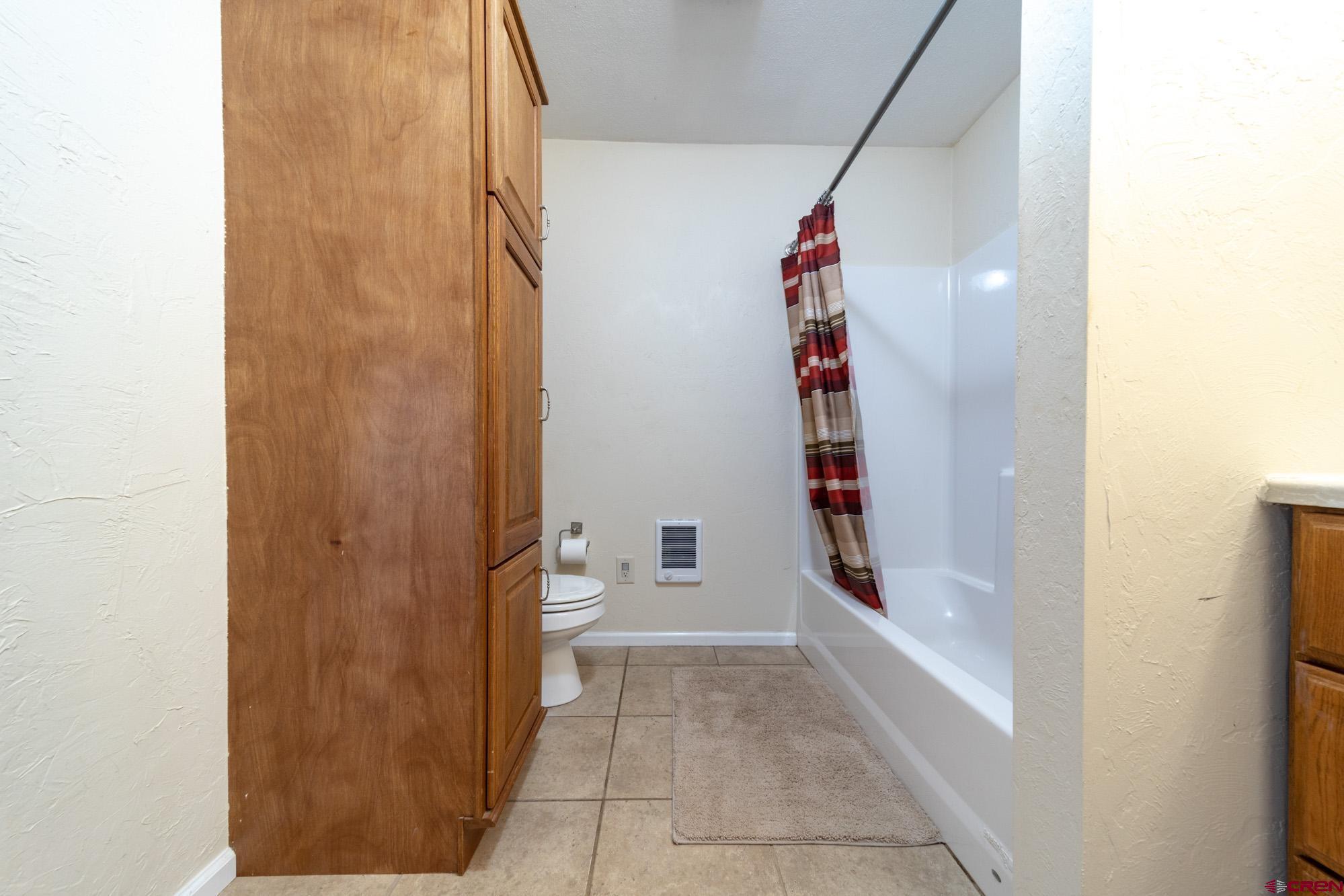 52888 Cornflower Road Delta, CO 81416 - Photo 14 of 28 a very nice looking room with a bathroom