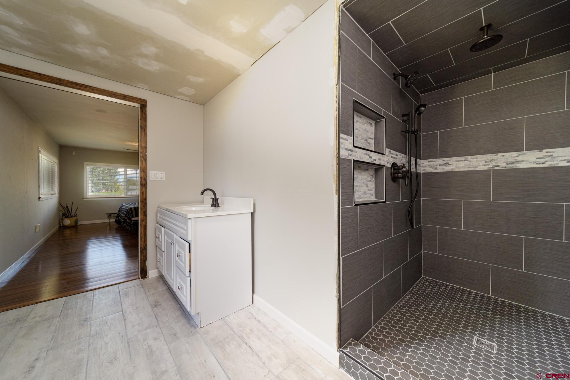 52888 Cornflower Road Delta, CO 81416 - Photo 18 of 28 a bathroom with a sink a toilet and shower