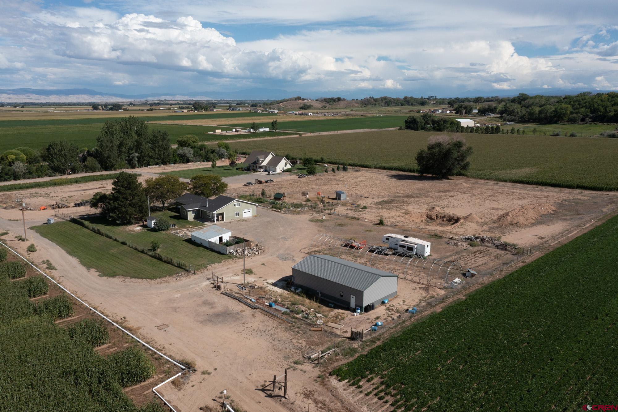 52888 Cornflower Road Delta, CO 81416 - Photo 2 of 28 an aerial view of a house with a yard