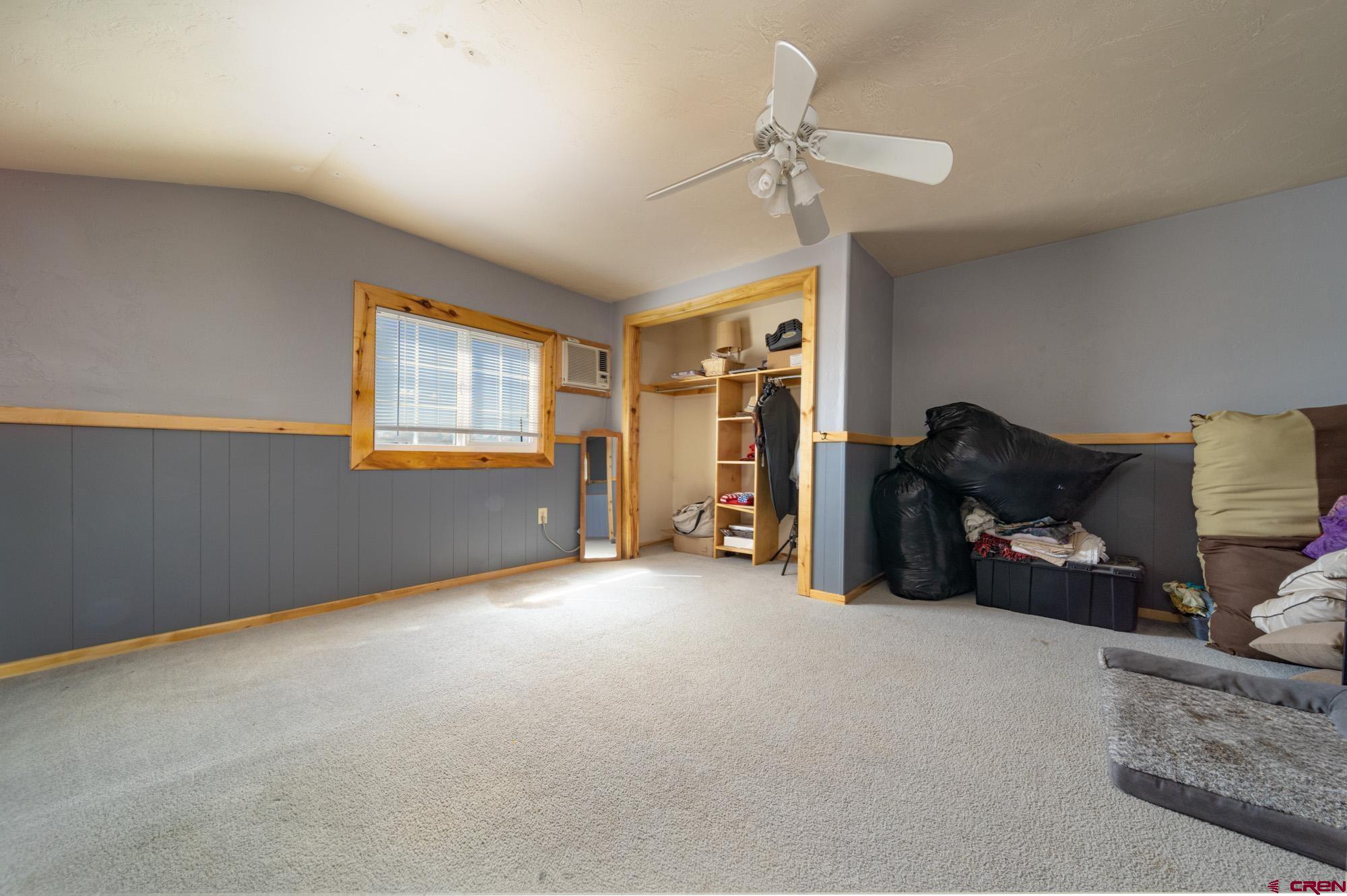 52888 Cornflower Road Delta, CO 81416 - Photo 21 of 28 a view of livingroom with furniture and windows