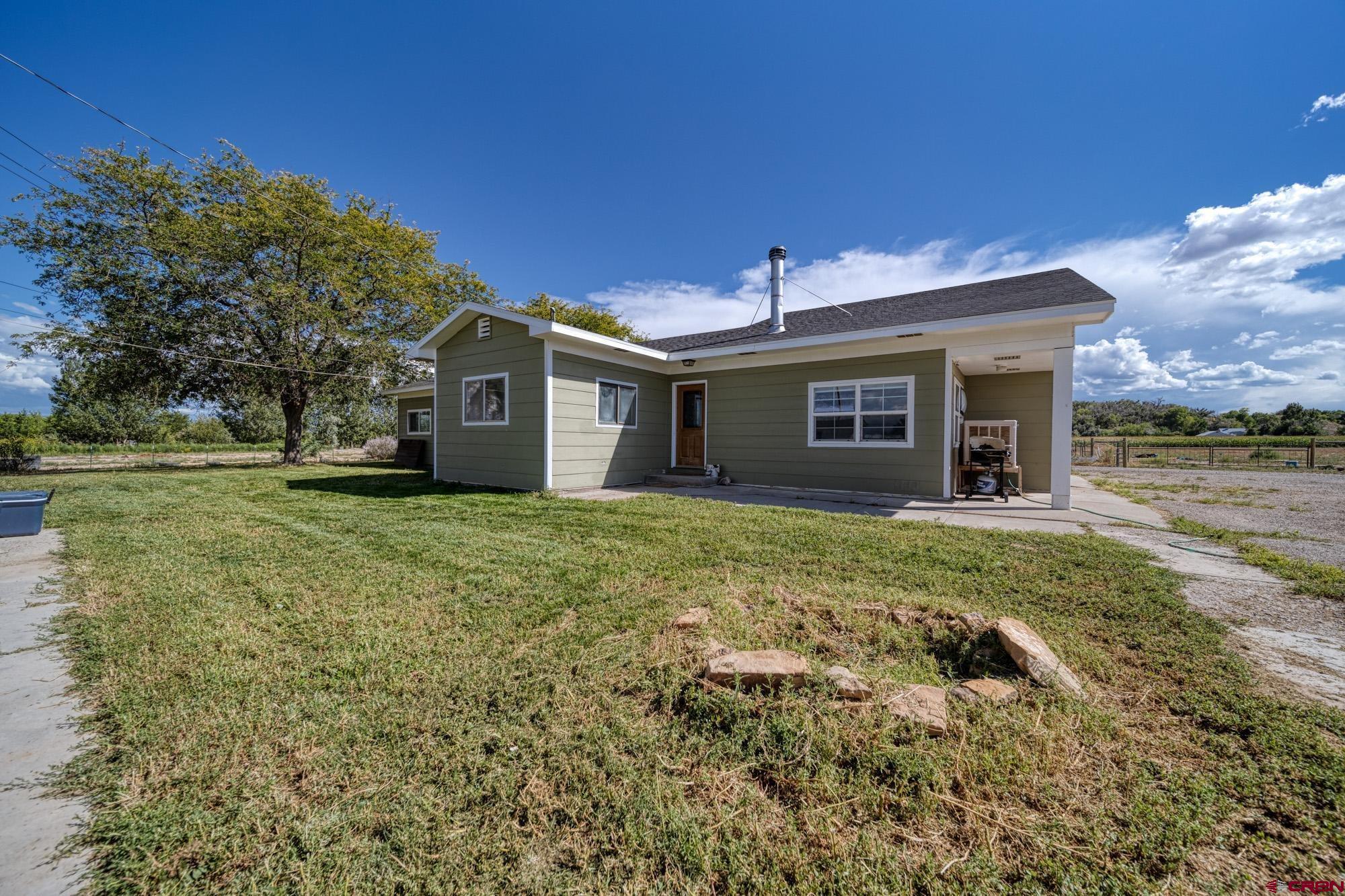 52888 Cornflower Road Delta, CO 81416 - Photo 3 of 28 a view of a house with a yard