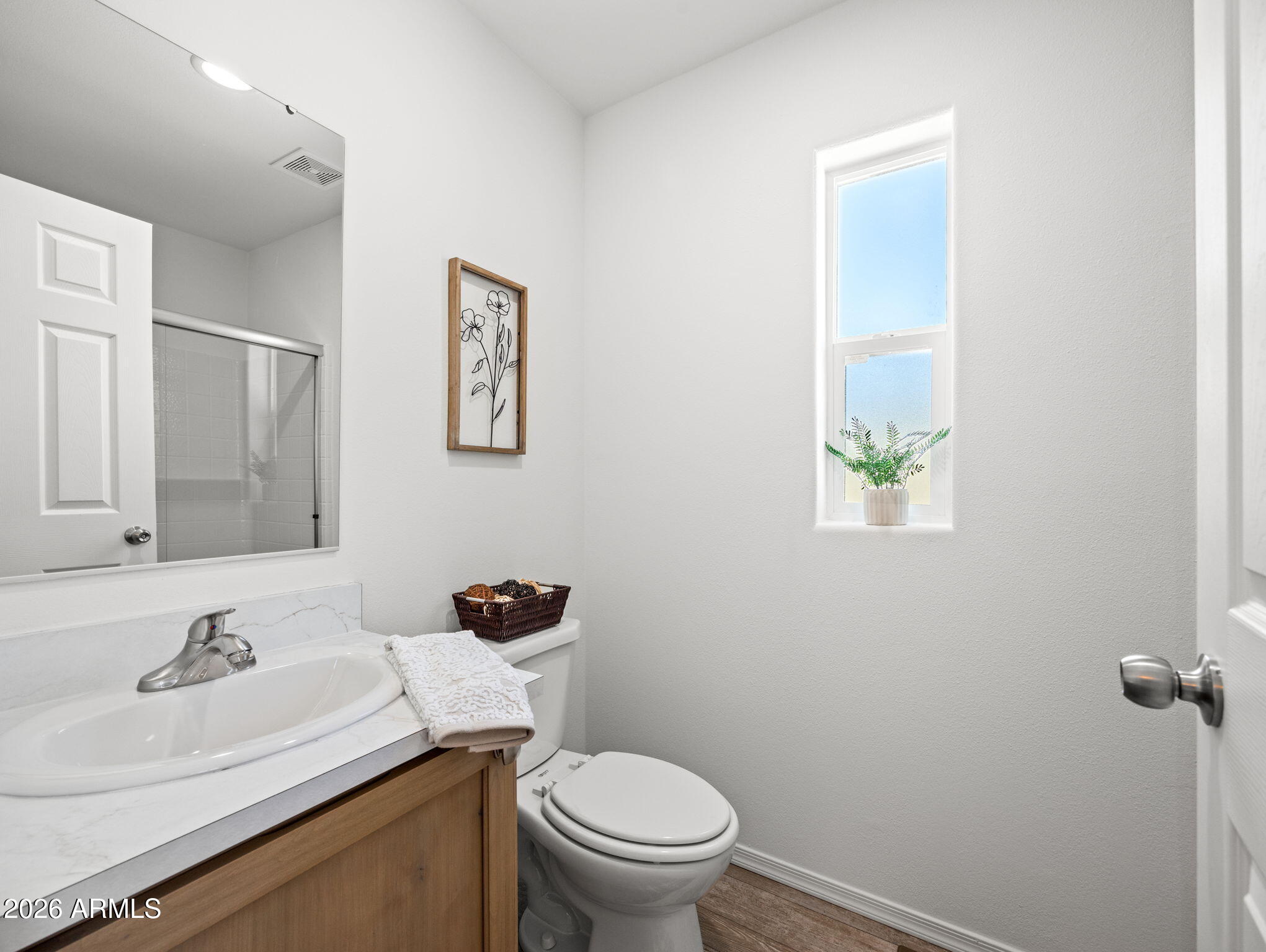 18296 Frontier Road Peeples Valley, AZ 86332 - Photo 23 of 44 a bathroom with a sink toilet and a mirror